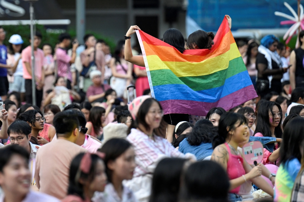 People attend the Pink Dot rally in Singapore, June 29, 2024. — Reuters pic