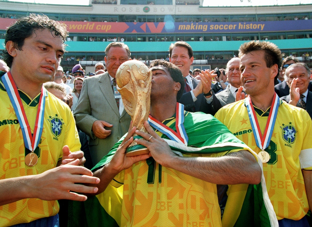 This file picture shows Brazil forward Romario kissing the Fifa World Cup trophy as teammates Branco (left) and Dunga look on after Brazil defeated Italy in the 1994 final at the Rose Bowl in Pasadena, July 17, 1994. — AFP pic This file picture shows Brazil forward Romario kissing the Fifa World Cup trophy as teammates Branco (left) and Dunga look on after Brazil defeated Italy in the 1994 final at the Rose Bowl in Pasadena, July 17, 1994. — AFP pic