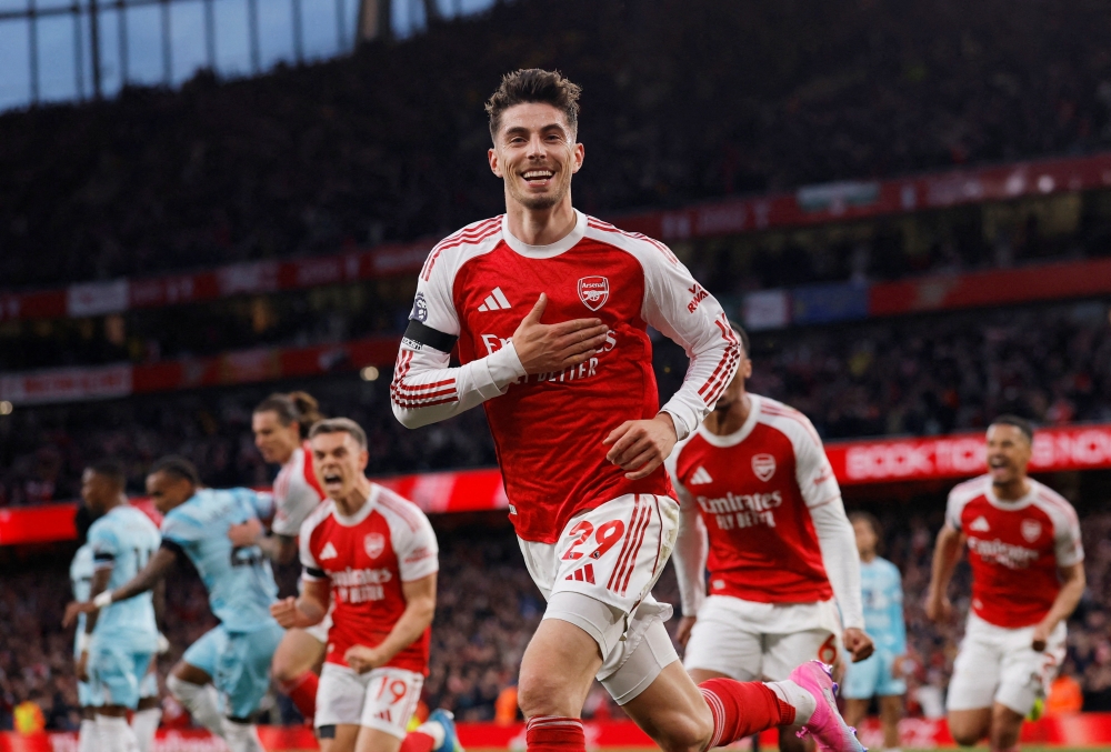 Arsenal’s Kai Havertz celebrates after scoring against Burnley during their Premier League match at the Emirates Stadium in London, May 18, 2026. — Reuters pic