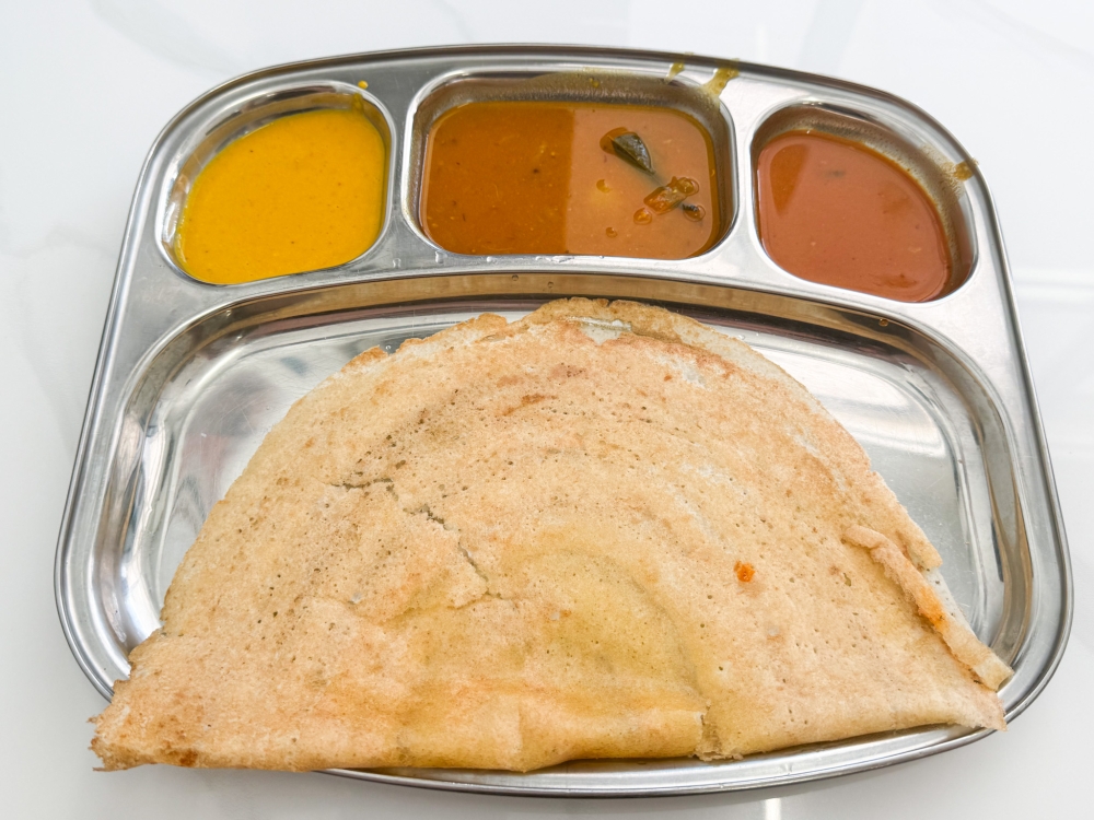 Ghee Thosai is reminiscent of homemade versions, featuring a softer texture and just a whisper of clarified butter. — Picture by Lee Khang Yi