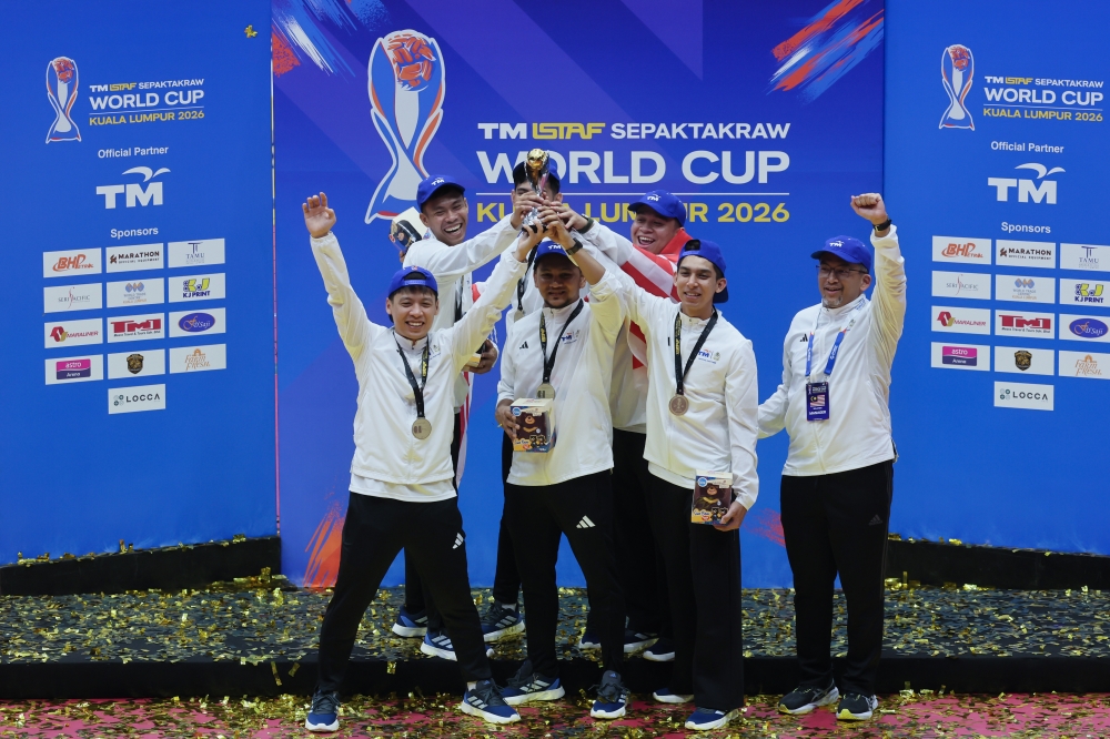 The national sepak takraw team lift the trophy after defeating India in the quadrant final at the 2026 Sepak Takraw World Cup at Stadium Titiwangsa, Kuala Lumpur, May 19, 2026. — Bernama pic