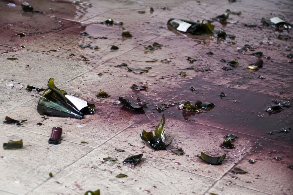 Wine bottles rain down from Woodlands HDB unit as Singapore police lock down block in five-hour standoff