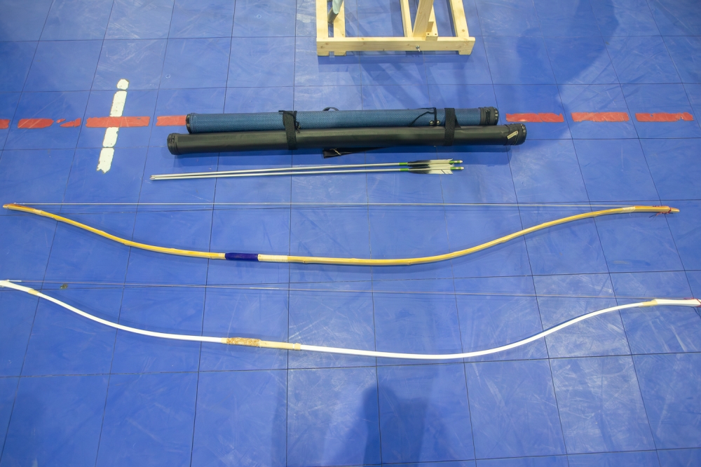 Traditional Japanese archery equipment, including asymmetric ‘yumi’ (bows) and feathered ‘ya’ (arrows), laid out before a kyudo martial arts demonstration. — Picture by Raymond Manuel