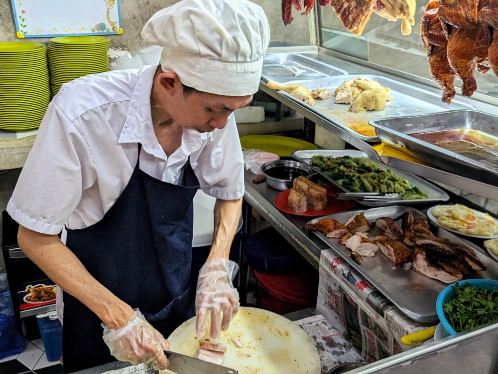 The importance of eateries like these cannot be overstated; they are the backbone of society, keeping the average Joe fed every day. — Picture by Ethan Lau