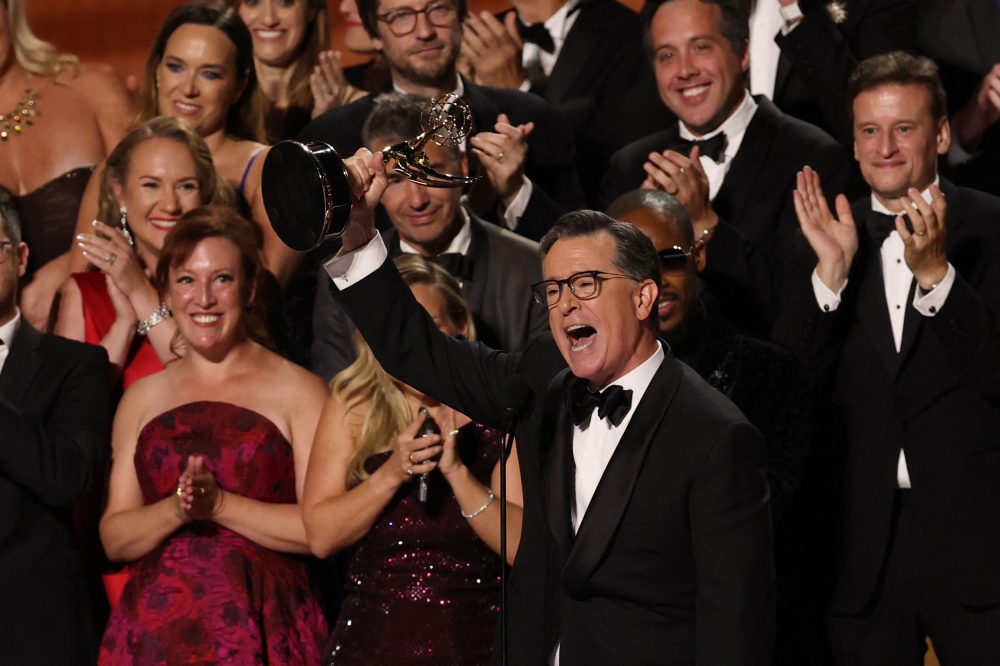 Stephen Colbert accepts the Outstanding Talk Series Emmy for ‘The Late Show’ at the 77th Primetime Awards in Los Angeles, September 14, 2025. — AFP pic