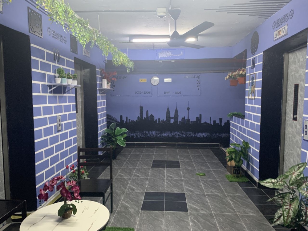 A newly-transformed lift lobby in PPR Lembah Subang 1 under the K2K initiative. — Picture courtesy of Think City