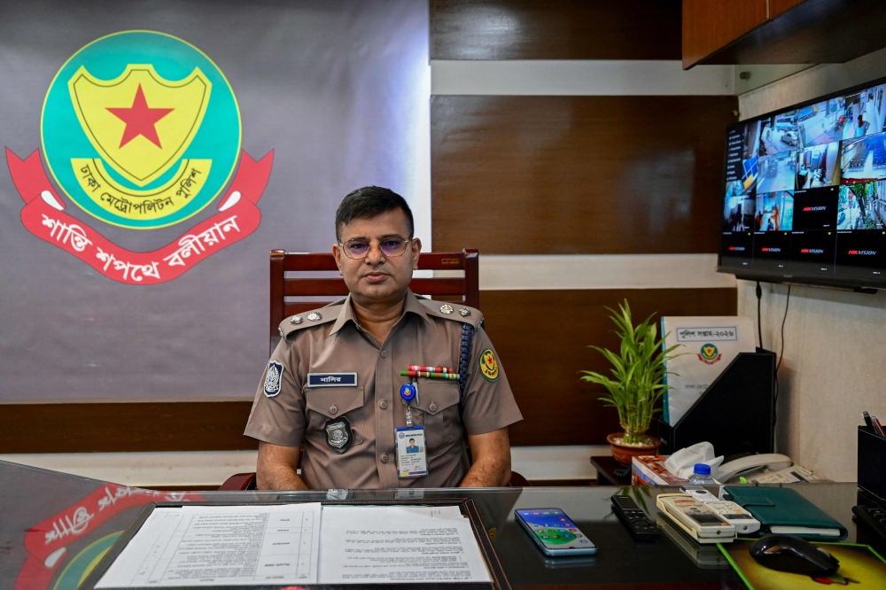 City police spokesman NM Nasiruddin poses for a photograph at his office in Dhaka May 14, 2026. — AFP pic