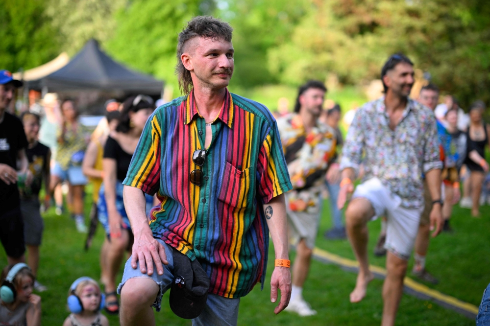 People attend the annual European Mullet Cup in Audregnies, southern Belgium, May 23, 2026. — AFP pic