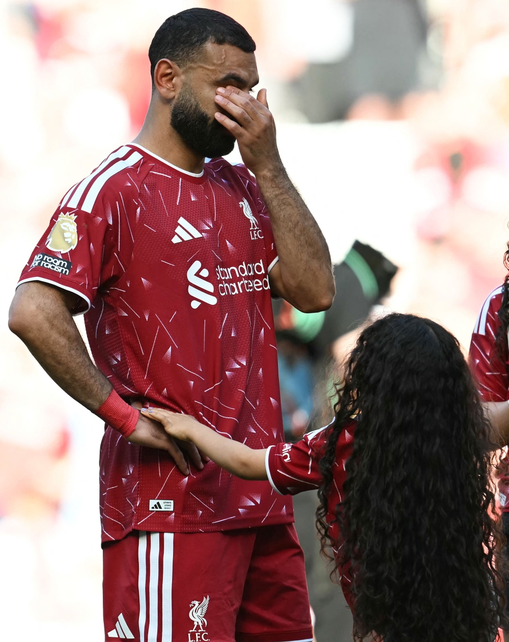 Liverpool’s Egyptian striker #11 Mohamed Salah reacts with his daughter on the pitch after the English Premier League football match between Liverpool and Brentford at Anfield in Liverpool May 24, 2026. — AFP pic 