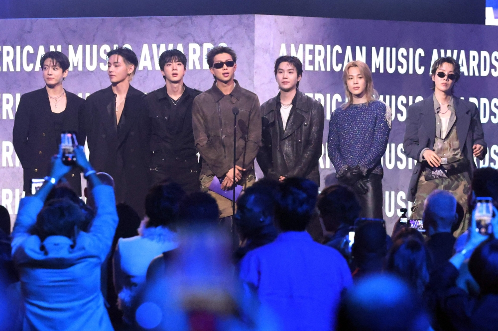 BTS presents an award on stage during the American Music Awards at the MGM Grand Garden Arena in Las Vegas, Nevada on May 25, 2026. — AFP pic 