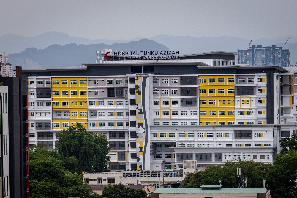 A general view of Tunku Azizah Hospital in Kuala Lumpur on June 26, 2025. A general hospital needs thousands of nurses, doctors, pharmacists, allied health professionals, medical assistants, laboratory technicians, administrators, cleaners, engineers, drivers, and maintenance staff. — Picture by Firdaus Latif