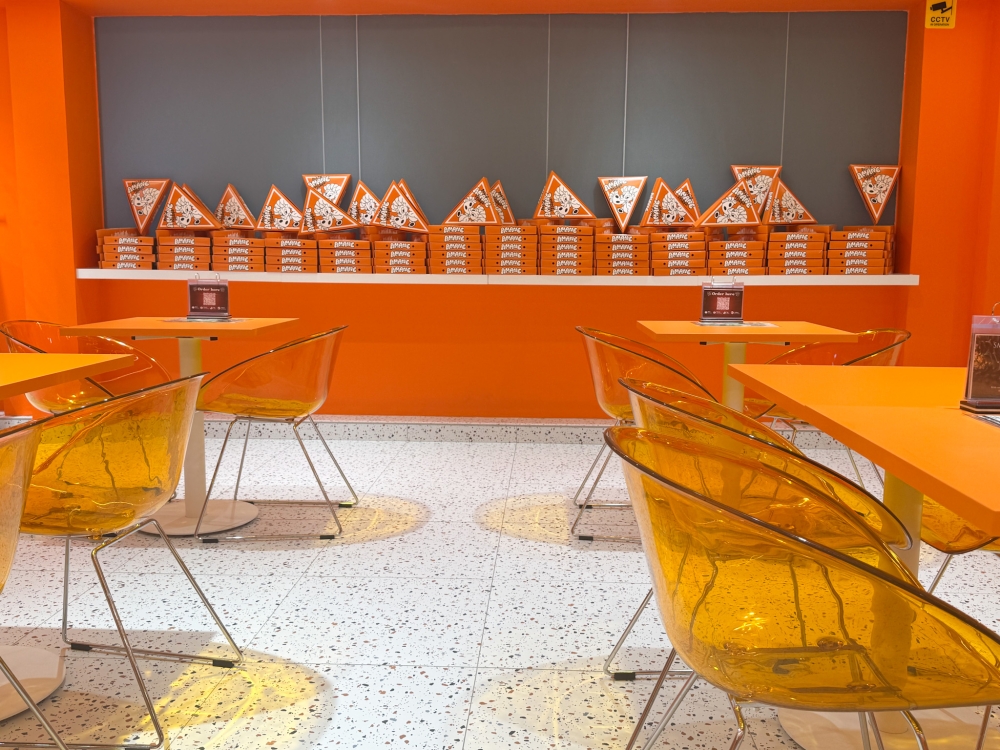 Orange pops up everywhere in their eatery which once housed Dottys in Taman Tun Dr Ismail. 