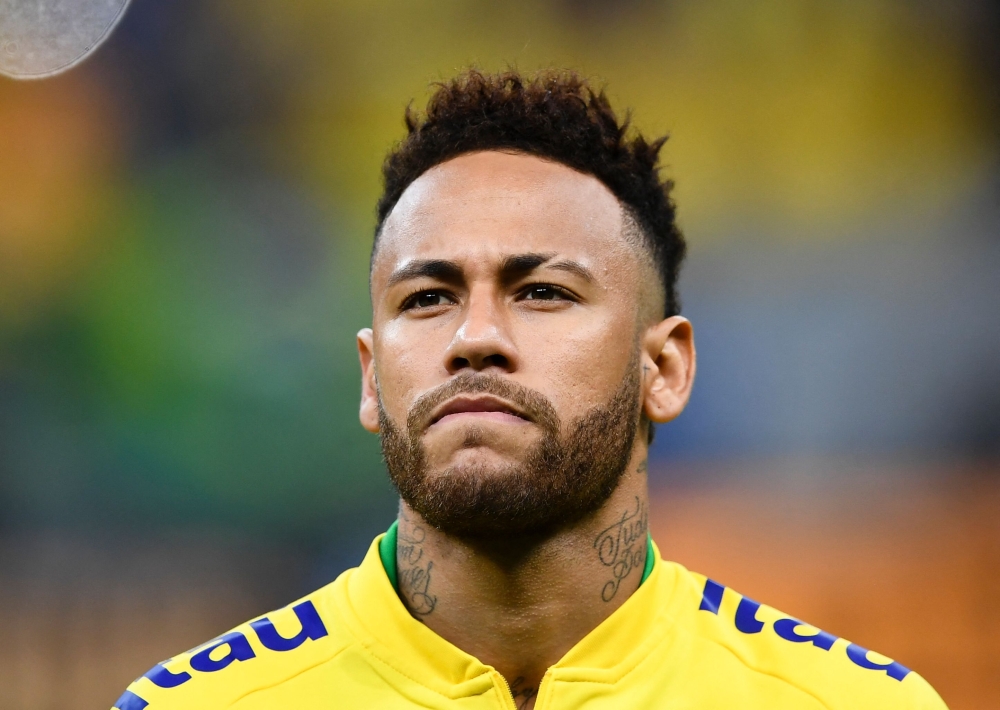 Brazil sweat on Neymar as calf injury puts World Cup opener in doubt
