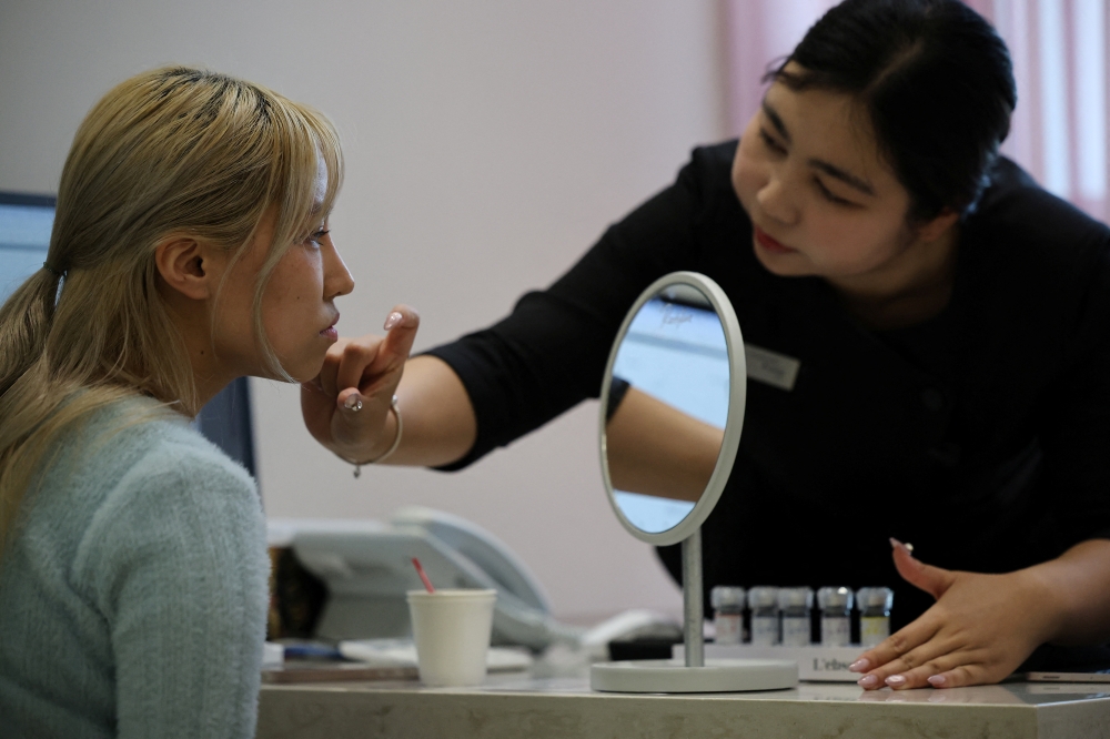 Cindy Gu from the US receives a skin consultation at Lienjang Clinic in Seoul, South Korea, April 29, 2026. — Reuters pic 