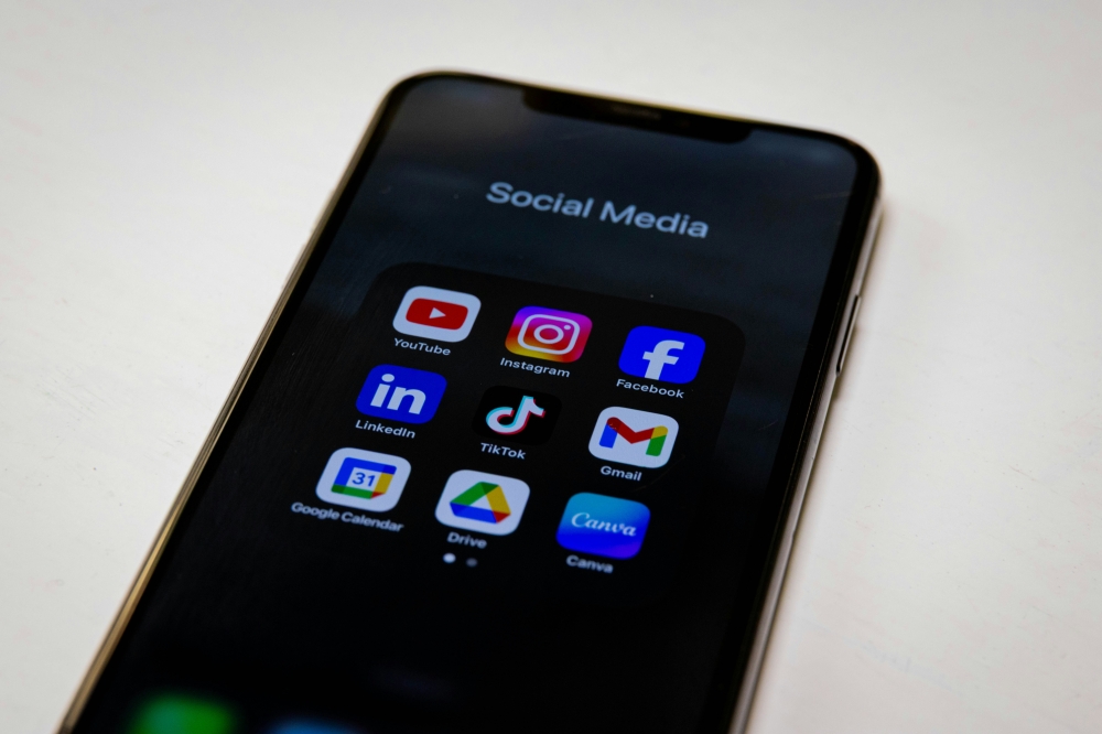 The Malaysian Communications and Multimedia Commission specifically names Facebook,Instagram, TikTok, and YouTube as the platforms barred to users under age 16. — Unsplash pic