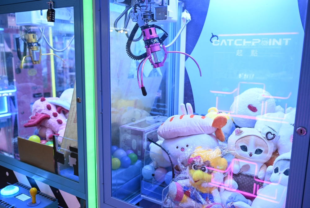 This photo taken on May 11, 2026 shows claw machines in an arcade centre at a shopping mall in Hong Kong. — AFP pic