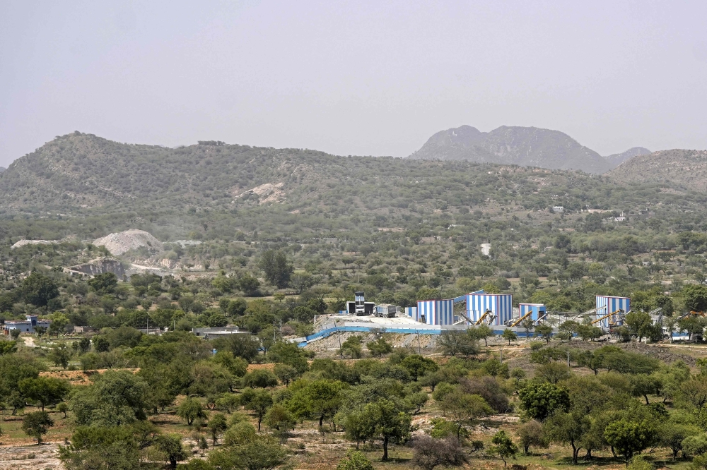 This photograph taken on May 19, 2026 shows a stone quarry (left) and crushing plant near Avinashi village in Rajasthan’s Neem Ka Thana town. — AFP pic 