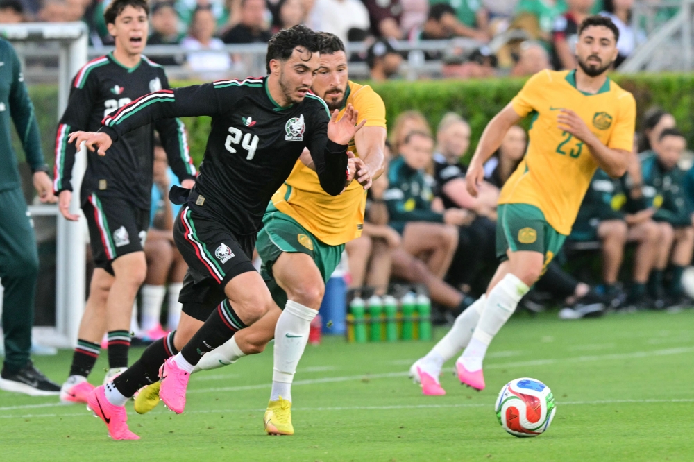 Socceroos vow to crash US party, O’Neill says Aussie grit can shock Group D favourites