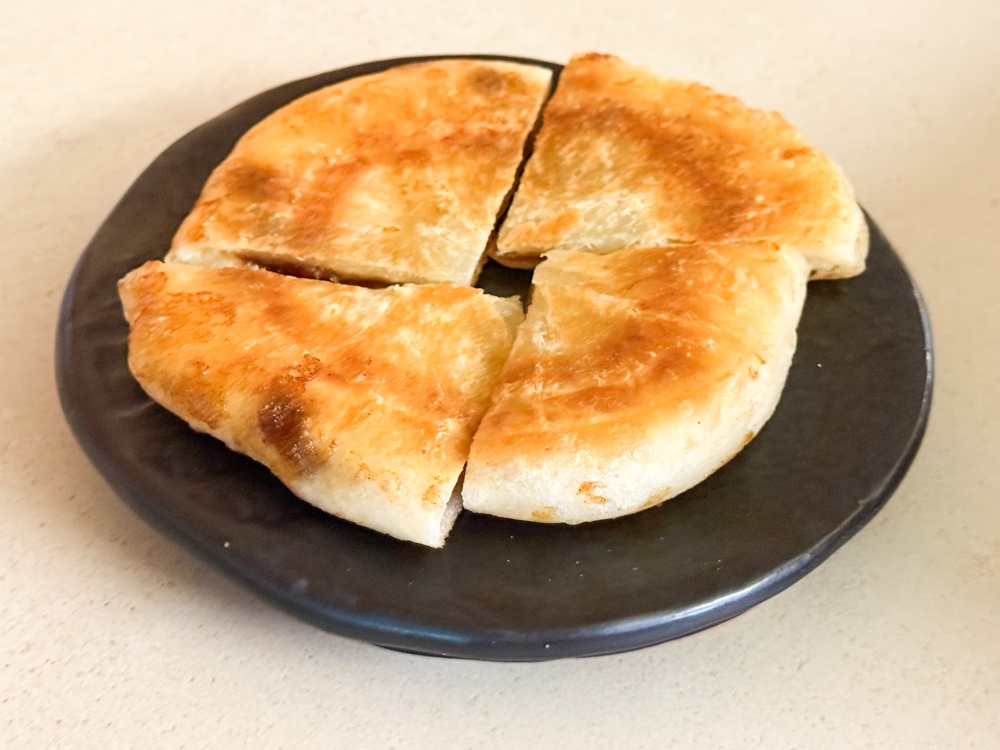 Snack on the popular Korean street treat ‘hotteok,’ which has a chewy texture. — Picture by Lee Khang Yi