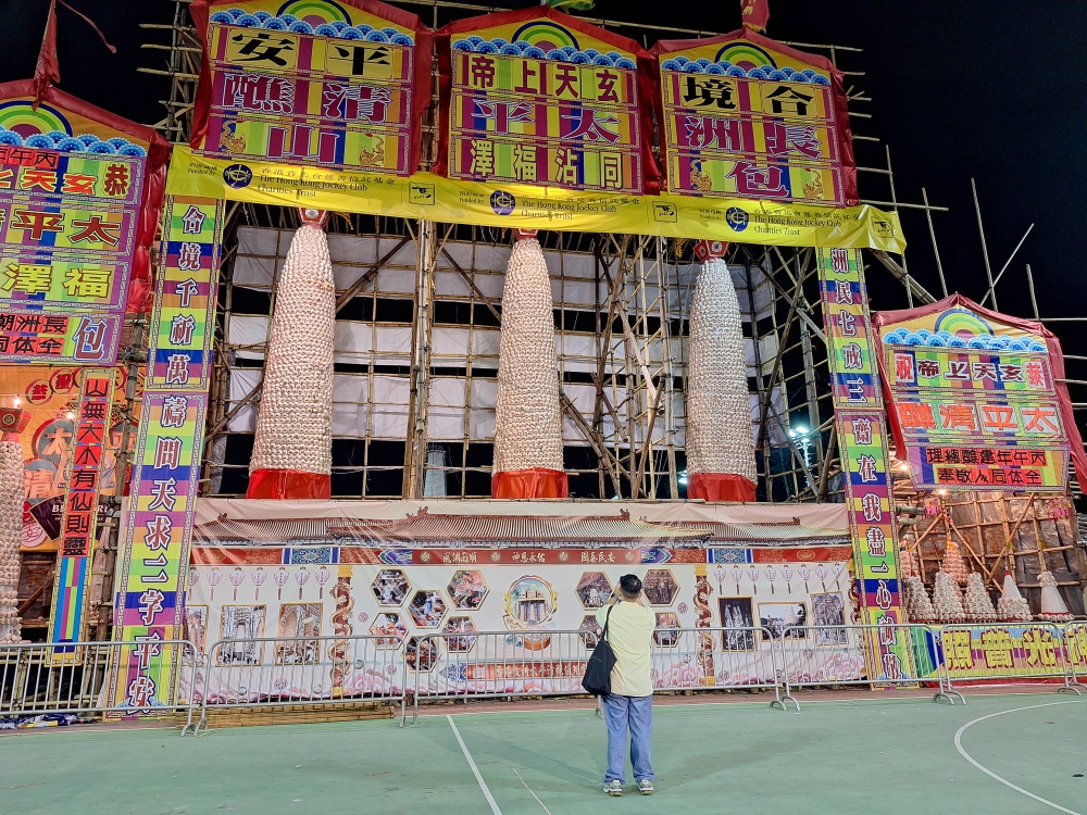 Seen here in the middle are the three large towers with 2,000 edible Ping On buns each, flanked by the medium and smaller bun towers at Pak Tai temple, Cheung Chau. — Picture by Ida Lim