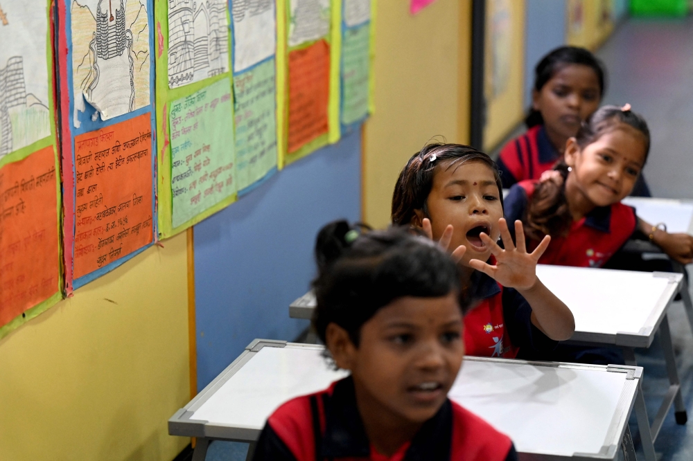Children attending a class at Signal Shala. — AFP pic