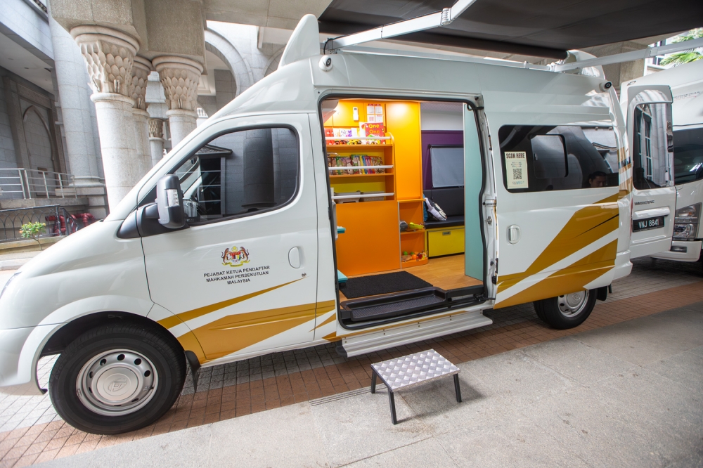 An exterior view of the Mobile Court (Mahkamah Bergerak) truck parked outside the court complex in Putrajaya, showcased during an exclusive interview with Malay Mail. May 19, 2026. — Picture by Raymond Manuel