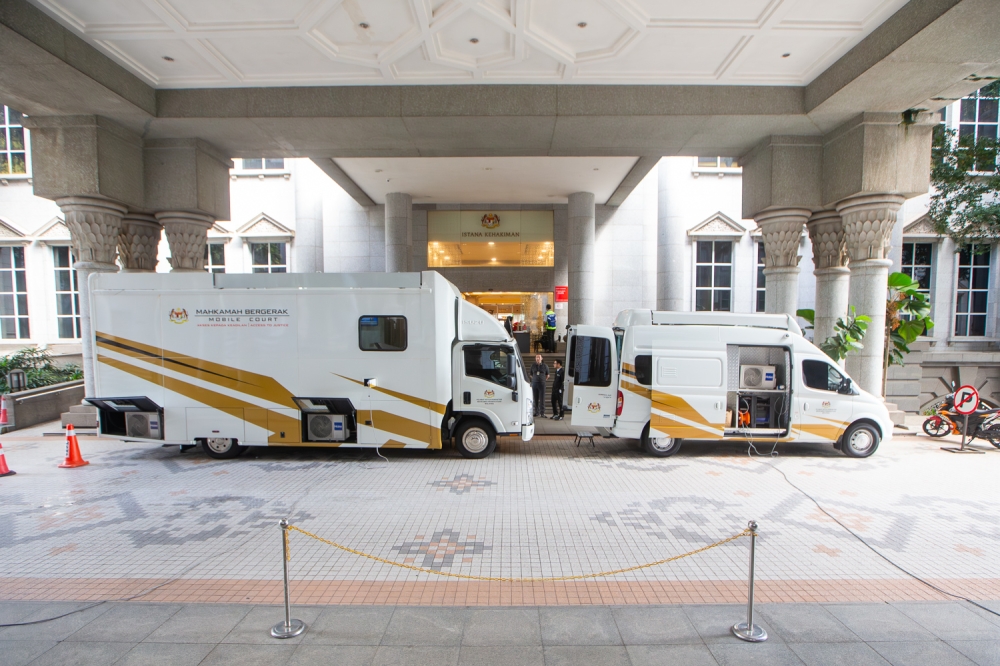 An exterior view of the Mobile Court (Mahkamah Bergerak) truck parked outside the court complex in Putrajaya, showcased during an exclusive interview with Malay Mail. May 19, 2026. — Picture by Raymond Manuel