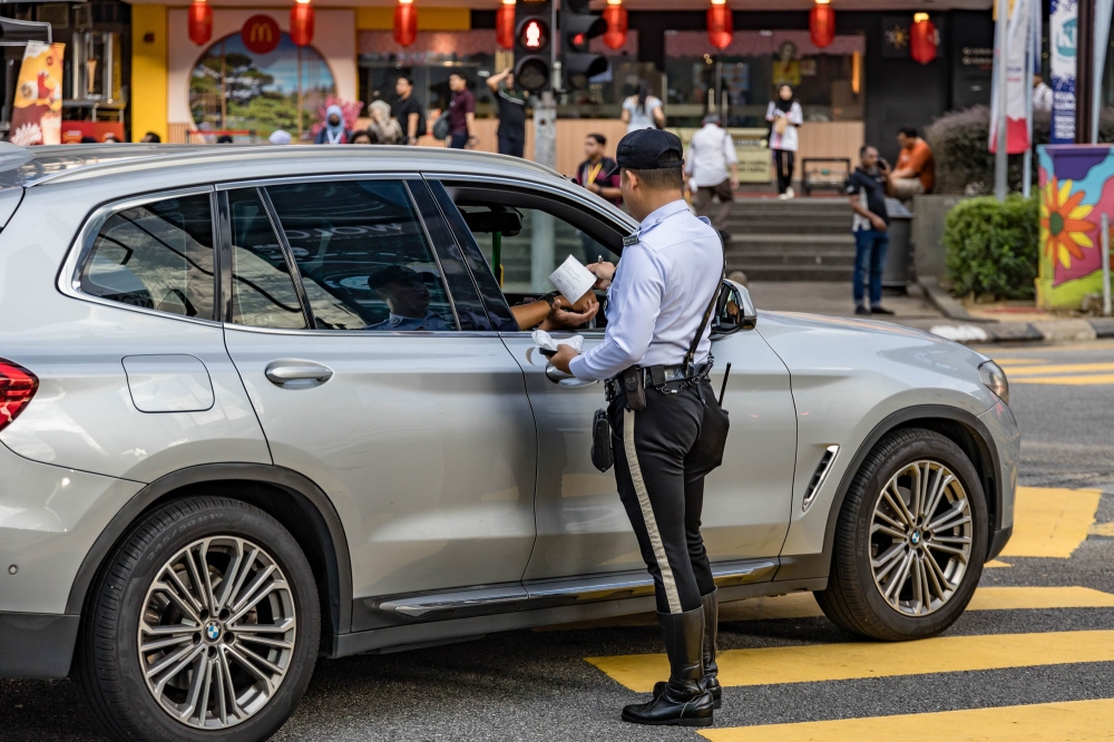 Film a cop, hurl abuse, get arrested: Sentul police nab Prot