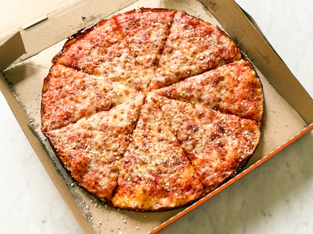 3 Cheese Edge to Edge Pizza is an alluring combination of cheese and tomato. — Picture by Lee Khang Yi