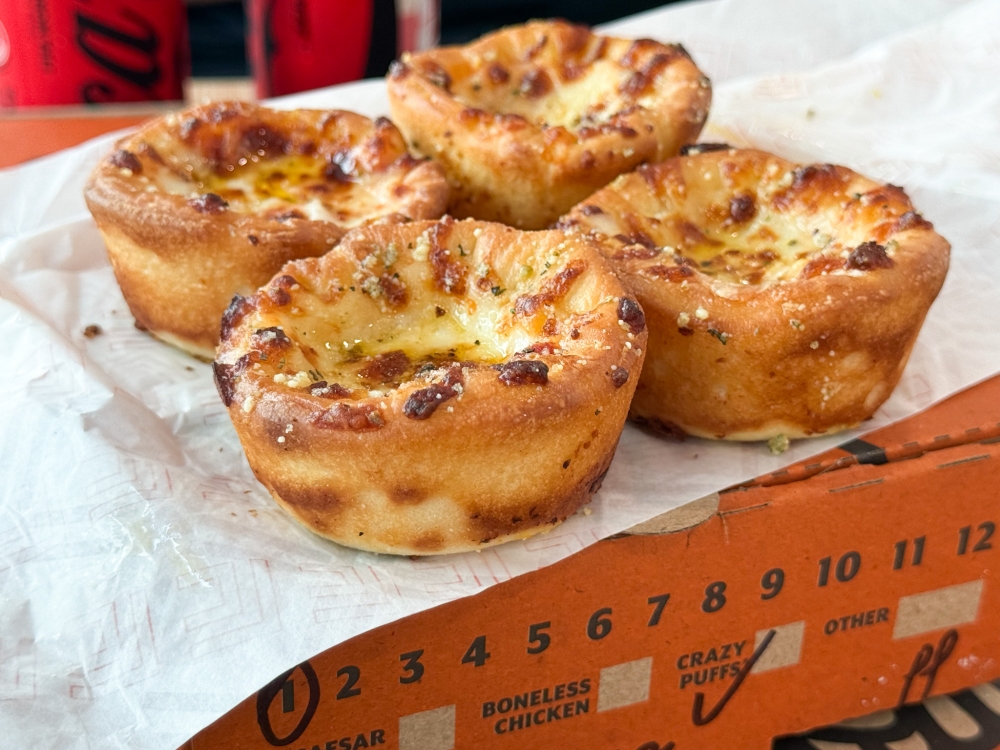 Crazy Puffs Pepperoni are easy-to-handle bites for busy people on the go. — Picture by Lee Khang Yi