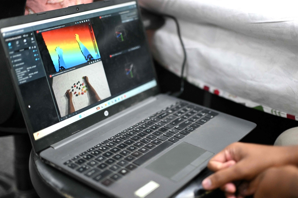 This photograph taken on May 13, 2026 shows an engineer annotating data from a RGB camera recording actions through motion capture at AI data company Objectways’ office in Tamil Nadu’s Karur district. — AFP pic 