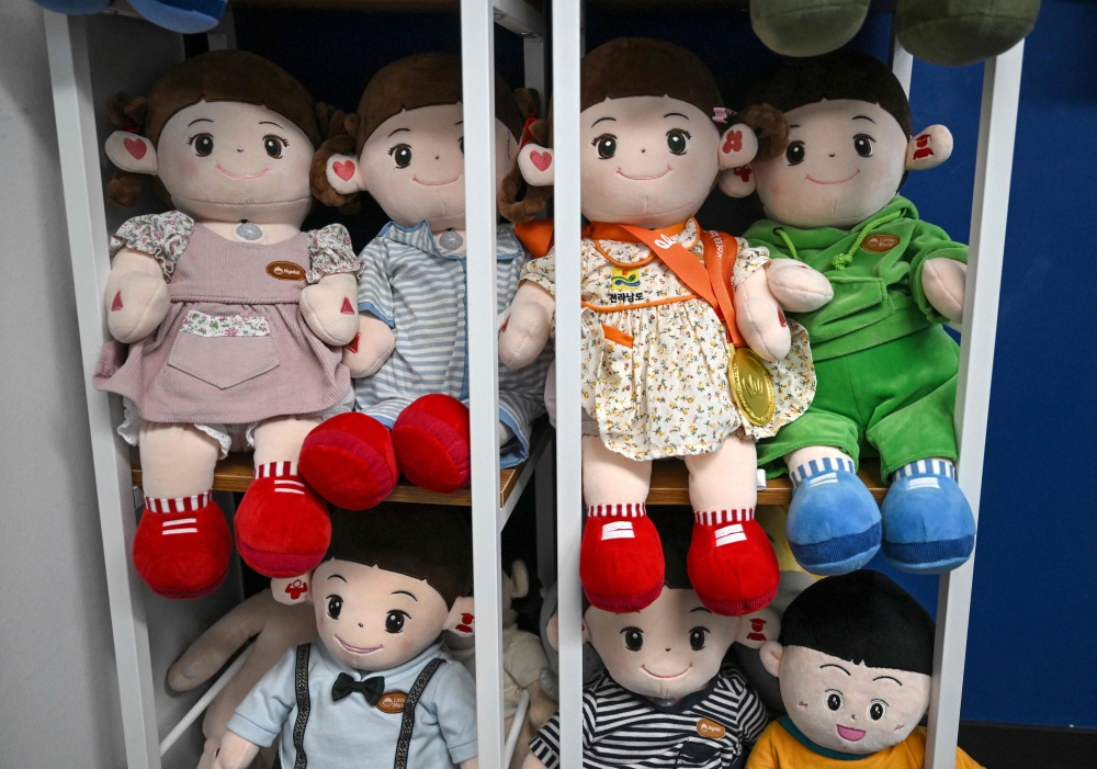 This picture taken on May 6, 2026 shows Hyodol’s AI-powered healthcare dolls designed for elderly people displayed at the company’s headquarter in Anyang. — AFP pic 