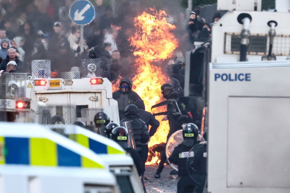 UK minister brands Northern Ireland unrest ‘racist thuggery’ after anti-immigration violence