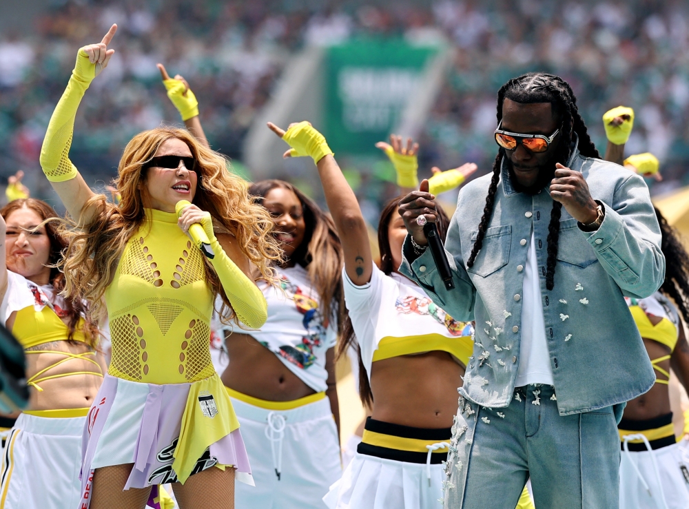 Shakira and Burna Boy perform during the opening ceremony before the match between Mexico and South Africa. — Reuters pic