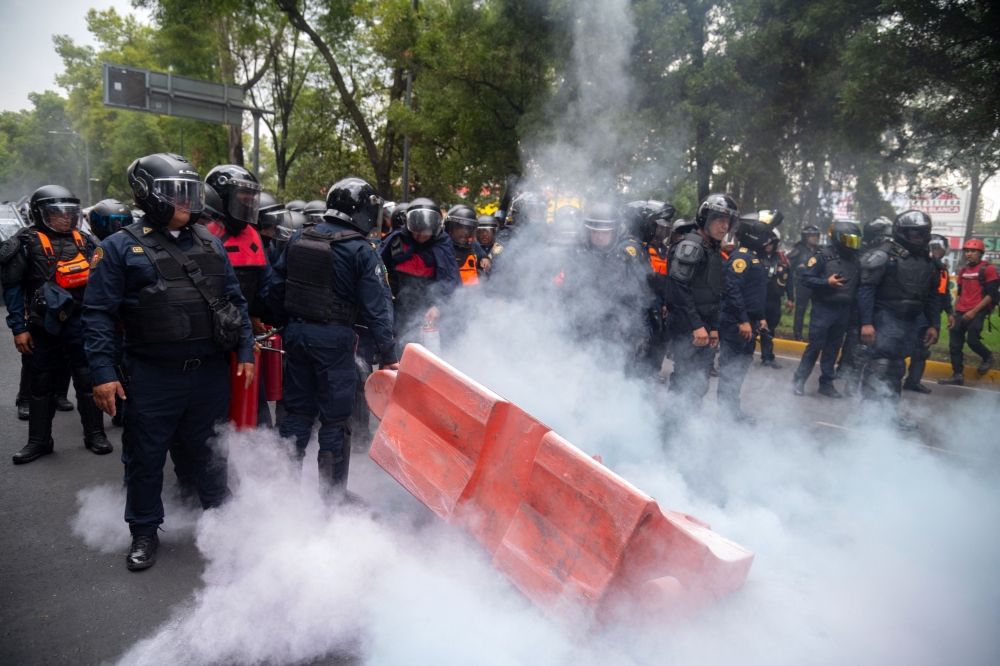 World Cup opener marred by clashes as teachers, activists protest outside Azteca stadium