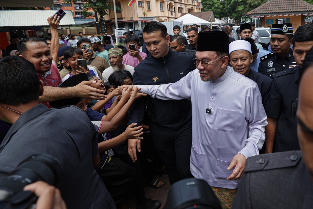 Obey Malaysian regulations or action will be taken, Anwar tells Rohingya refugees