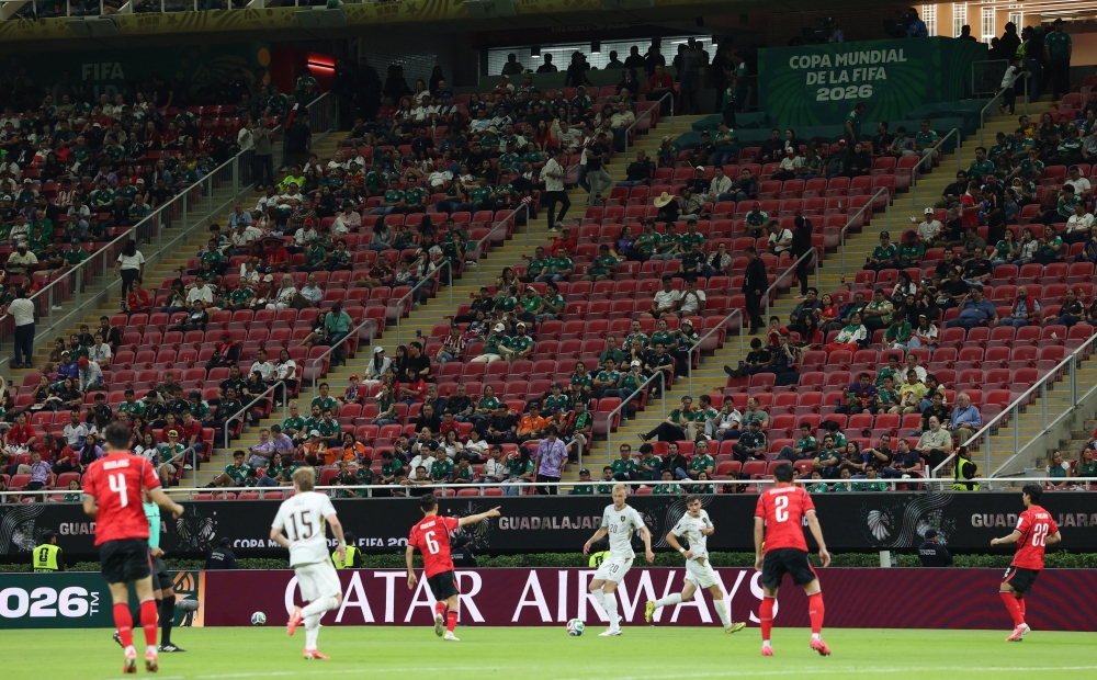 Rows of empty seats at World Cup match put Fifa ticket pricing under fresh scrutiny