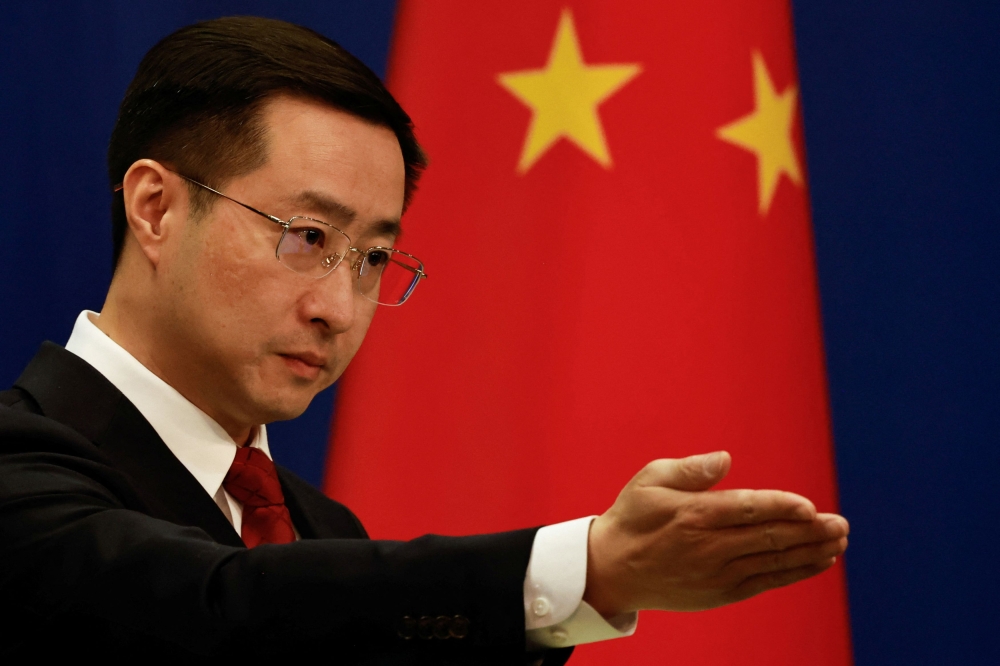 Beijing says US analyst detained for alleged espionage activities
