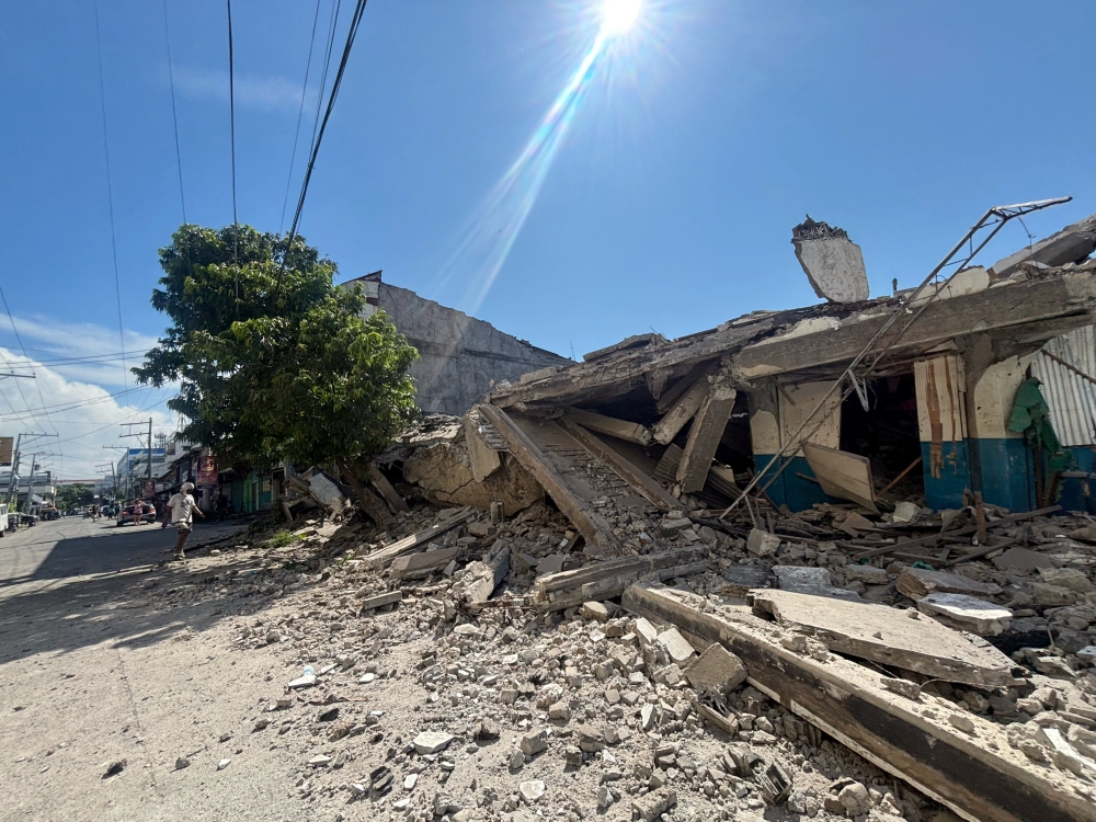 Rescuers battle rain and aftershocks in Mindanao as quake toll lowered to 46, missing rise