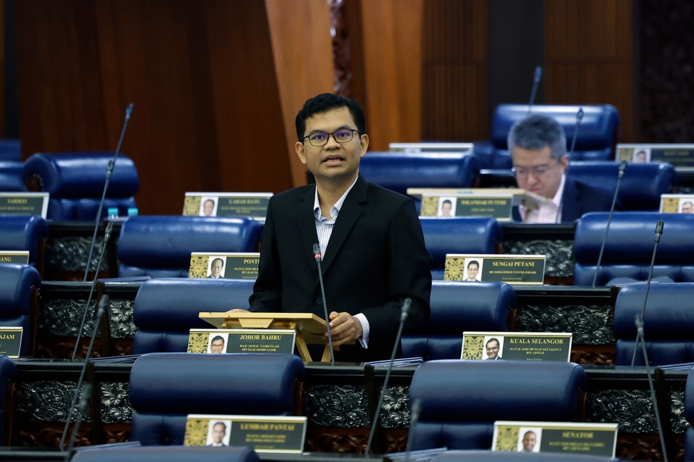 Empty seats are seen in the Dewan Rakyat while Economy Minister Akmal Nasrullah Mohd Nasir speaks during a parliamentary sitting on March 2, 2026. Absenteeism among MPs has sparked renewed debate over  accountability and parliamentary attendance. — Bernama pic