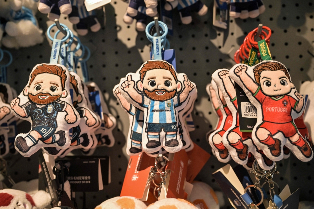This photo taken on June 5, 2026 shows merchandise of Lionel Messi of Argentina and Cristiano Ronaldo of Portugal — football teams that will participate in the Fifa World Cup 2026 — at the All Star Partner factory in Yiwu in eastern China’s Zhejiang province. — AFP pic 