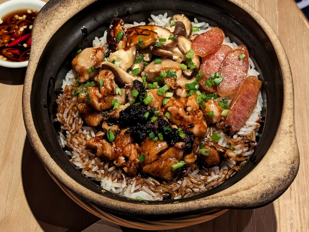 The claypot chicken rice doesn’t quite show off the full potential of the chicken. — Picture by Ethan Lau