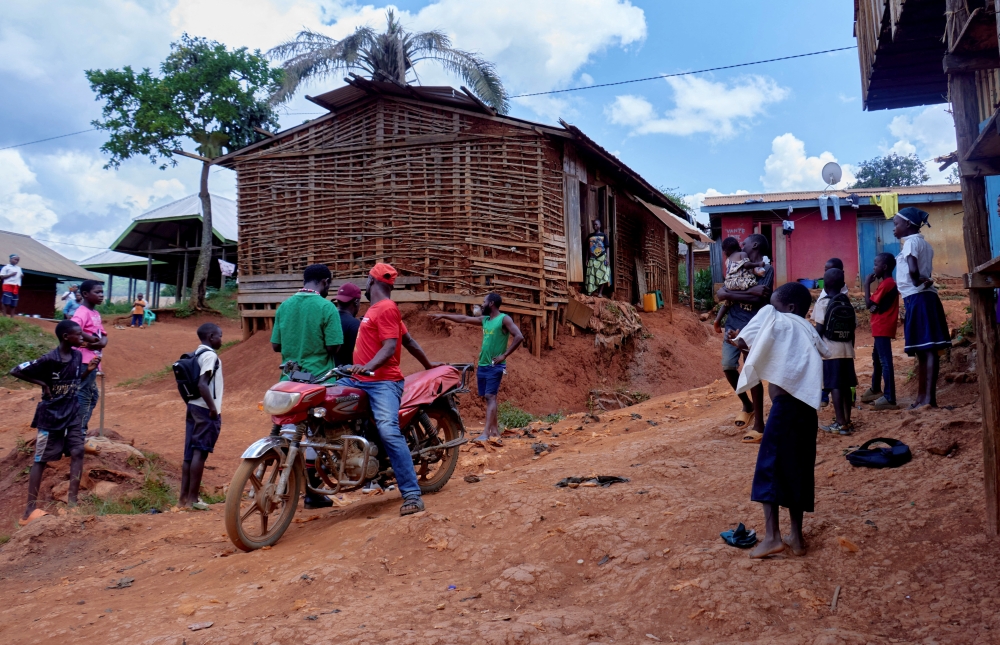 Jean-Marie Bakendedya, a neighbour of the late Congolese Pastor Paluku known as ‘Jeune Patron’, whom local authorities believe could be one of the first victims of a new Ebola outbreak involving the Bundibugyo strain outbreak and died on February 3, 2026, stands on the roadside where Paluku’s first coffin was torched in Quartier Shuni 1, a residential sector, in Mongbwalu, Djugu Territory of Ituri province, Democratic Republic of the Congo, June 4, 2026. — Reuters pic
