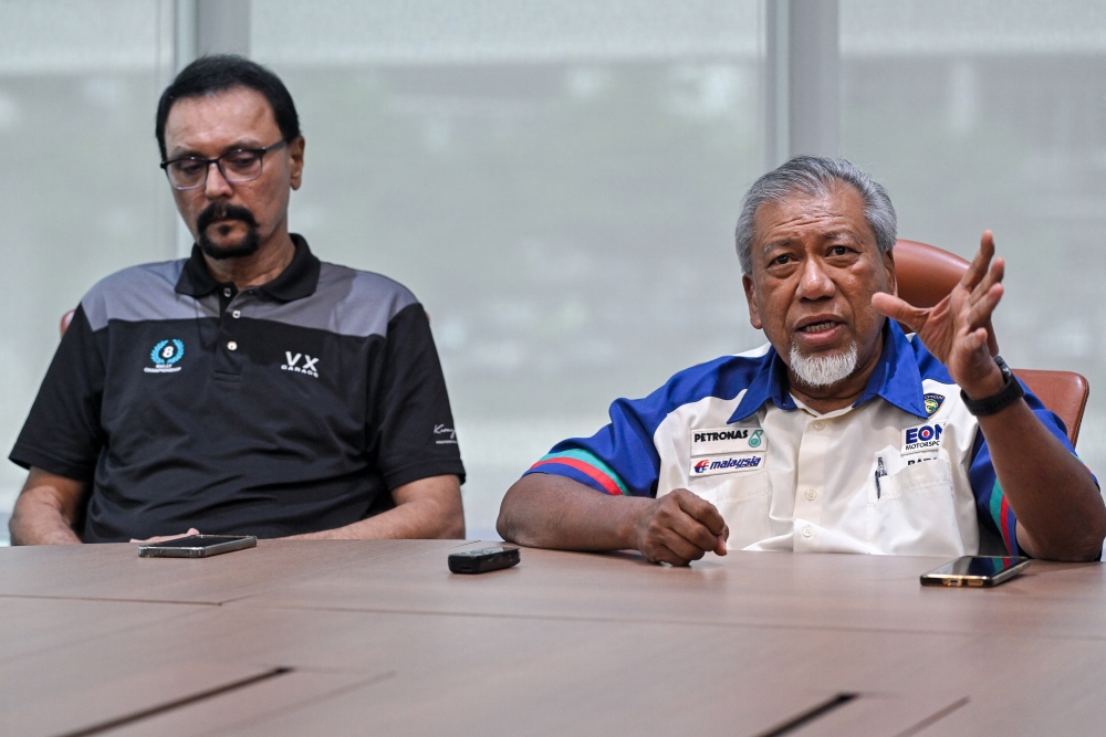 Former Proton Motorsport chief Datuk Abdul Razak Dawood (right) and Malaysian rally legend Karamjit Singh during an interview with Bernama at EON headquarters in Glenmarie Shah Alam, Selangor. — Bernama pic