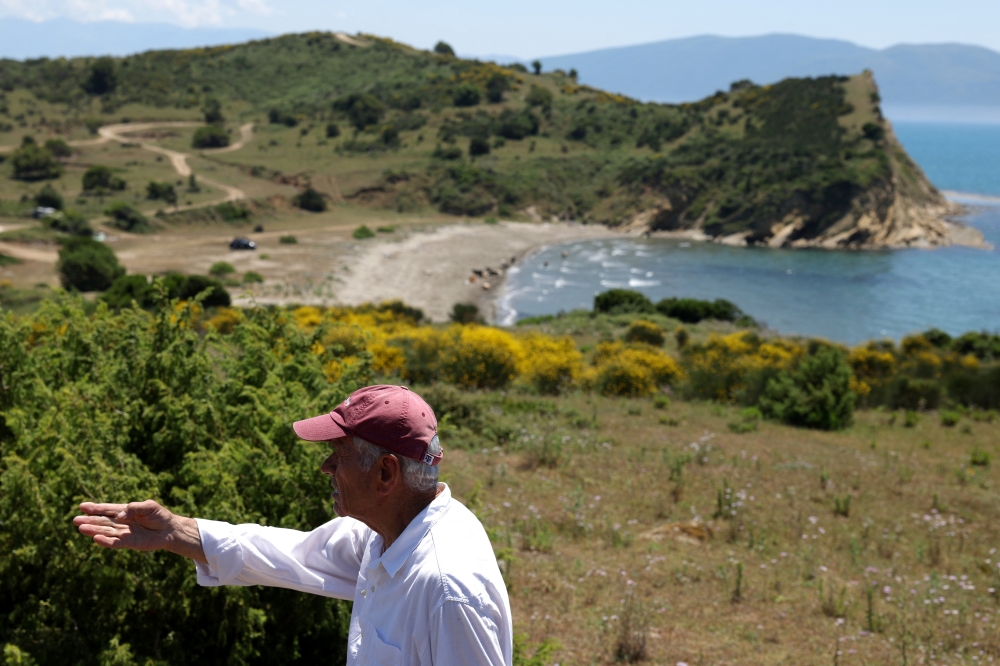 Kostaq Konomi, who claims to be one of the owners of the land where a luxury resort is planned by a company linked to Donald Trump’s son-in-law, Jared Kushner looks on at the bay of the Vjosa-Narta Protected Area, in Zvernec near Vlora, Albania, June 10, 2026. — Reuters pic  