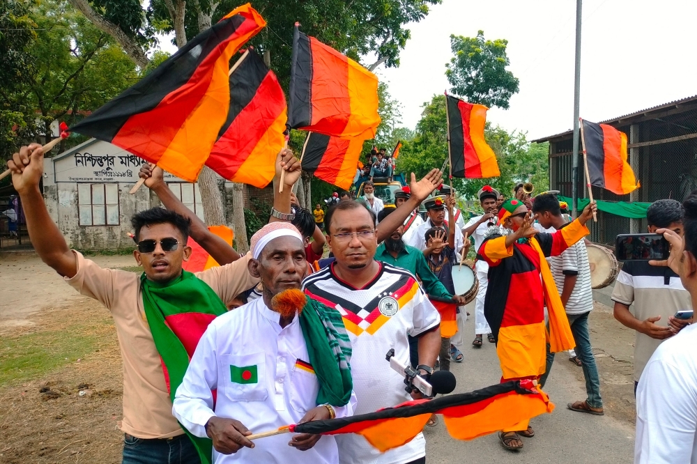 Across Bangladesh, rooftops fly Brazil and Argentina flags — but one Magura farmer’s devotion to Germany stands out in sheer scale. — AFP pic
