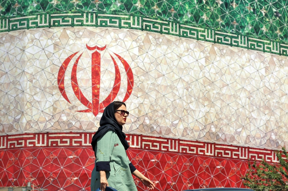 Iran says draft US deal would reopen Hormuz and grant oil‑sanctions waiver, nuclear curbs and release of frozen assets