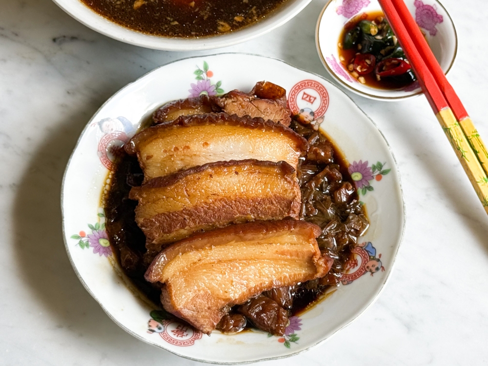 Braised Pork Belly with Mustard Greens was well-cooked, featuring tender pork belly and mustard greens that weren't overly salty — Picture by Lee Khang Yi