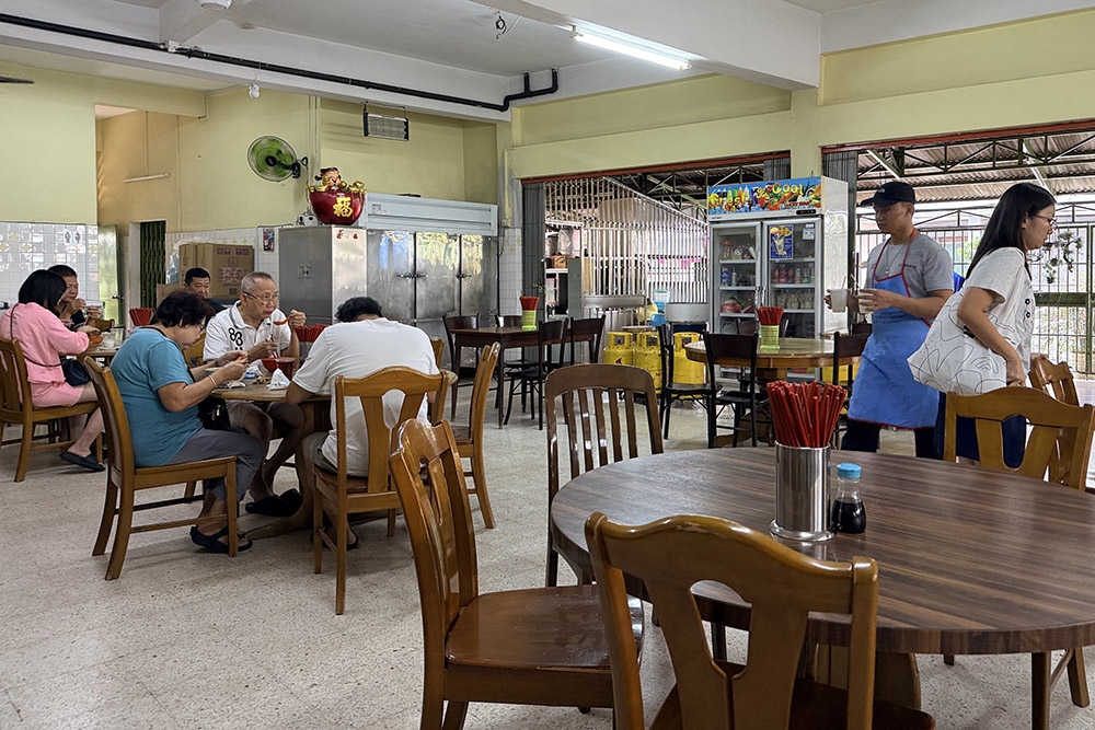Locals head here for bowls of their signature curry 'laksa'. 