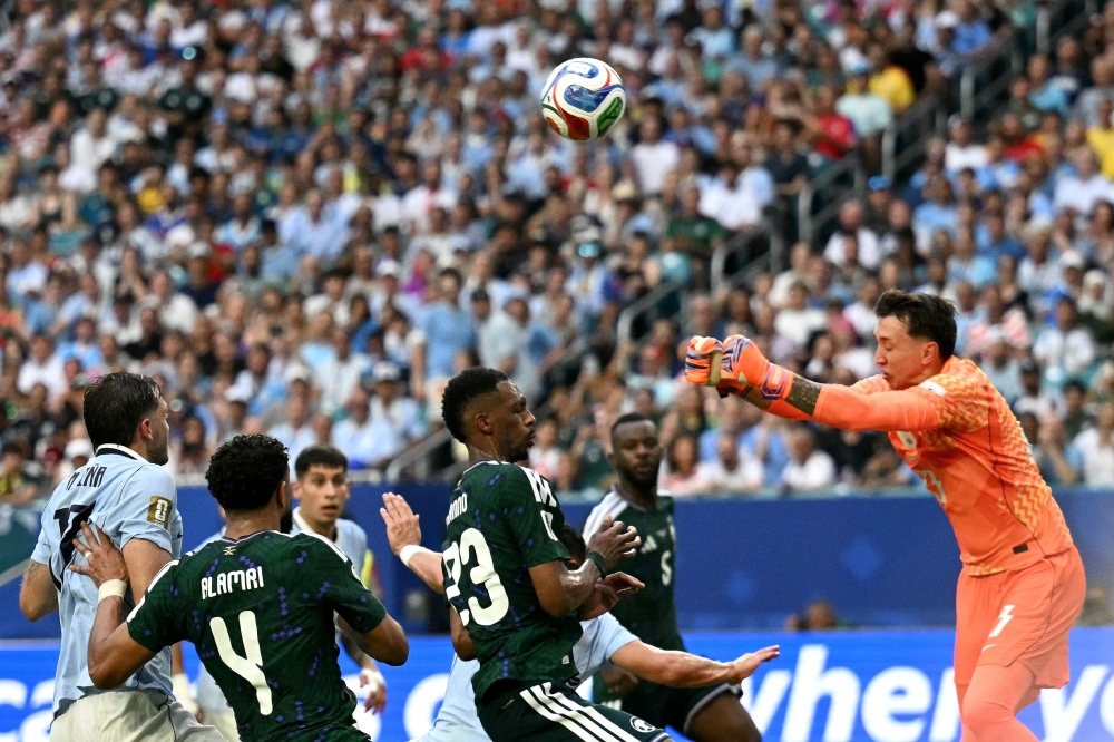 Uruguay sweat buckets in Miami as stubborn Saudi Arabia snatch point and keep Group H alive